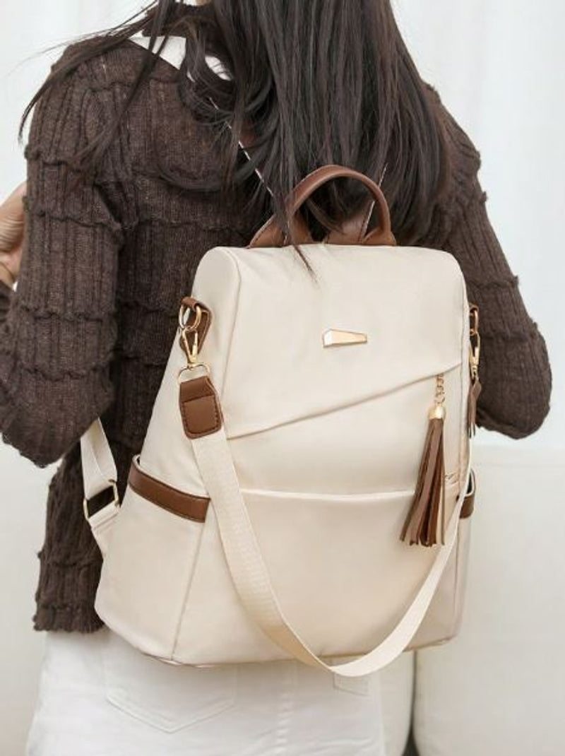 Mochila de tela de mujer en beige con detalles en marrón