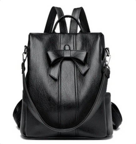 Mochila de piel de mujer negra con lazo